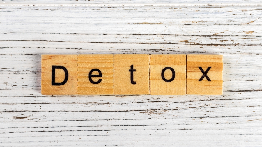 Detox word made with wooden blocks concept